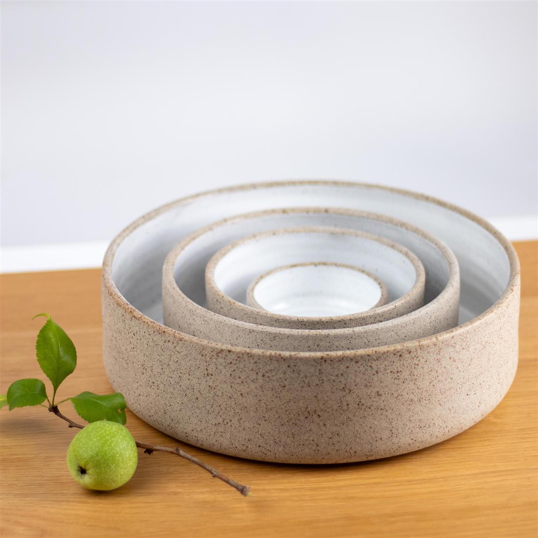 Four coordinating ceramic serving bowls in graduated sizes